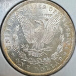 LOT 46 REV - 1884-O Morgan Dollar. Unc.